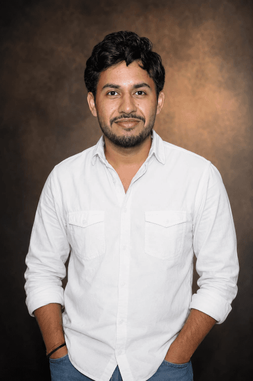 Harshit Sharma, waist-up studio portrait